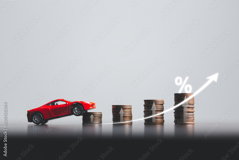 Wall mural Stacks of coins and red car with percentage symbol for increasing interest rates. Interest rate financial and mortgage rates. Icon percentage symbol and arrow pointing up. - Wall murals