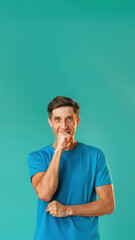 Unexpected success. Great chance. Amazing feelings. Attractive excited man in blue waiting dreaming...