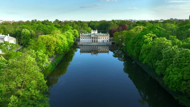 Aerial view of Lazienki Park in Warsaw, Poland on a sunny afternoon.
Royal Palace on the Isle - known as Baths Palace - divides the lake into two parts, a smaller northern lake and a larger southern.