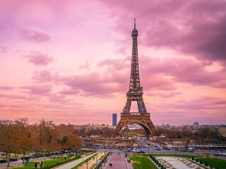 The Eiffel Tower over the Jardins du Trocadéro, or Trocadéro Gardens  in Paris, France, twilight moody purple and pink toned photo