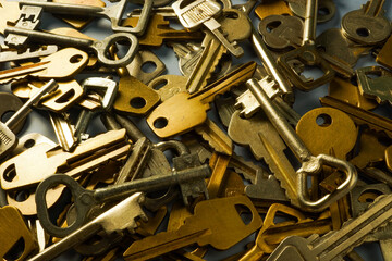 Lots of different metal keys. Conceptual background.