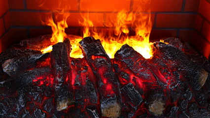 Close up of electric fireplace with orange and yellow fire flame.