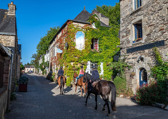 Horse Riding Through Picturesque Village Rochefort En Terre In The Department Of Morbihan In...