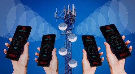 Hands with a phone on the background of 5G cell towers receiving a signal