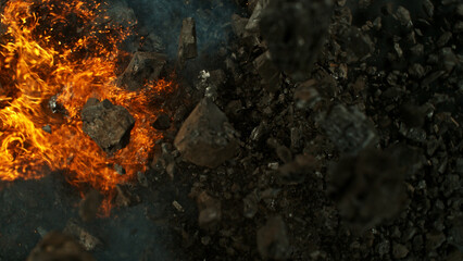 Burning coal with fire, top view shot.