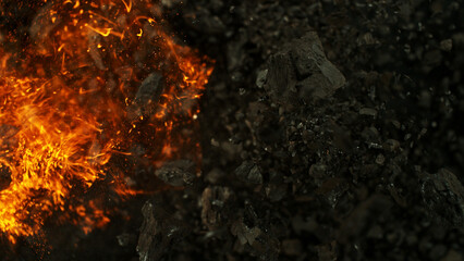 Burning coal with fire, top view shot.