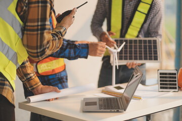 Fototapeta premium Professional Mechanical Engineer team Working on Personal Computer at Metal lathe industrial manufacturing factory. Engineer Operating lathe Machinery. Product quality Inspection