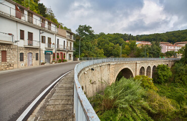 Naklejka premium street among the characteristic houses of Buonalbergo, a village in the mountains in the province of Benevento