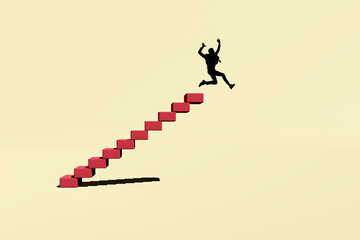Career downfall or career decline concept. Silhouette of a man falling from the top of a staircase.