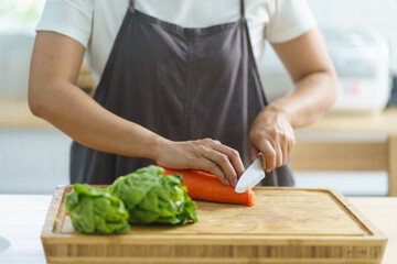 Prepare food  woman is preparing vegetable salad in the kitchen Healthy Food Healthy Cooking