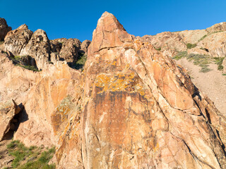 Tamgaly-Tas (Painted Rocks or Stones with Signs) with rock paintings of Tibetan iconography and...