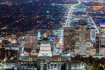 Utah State Capitol night view illuminated with lights at night after sunset, in Salt Lake City, mountain view