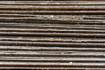 Texture of a pile of metal and concrete building scaffolding