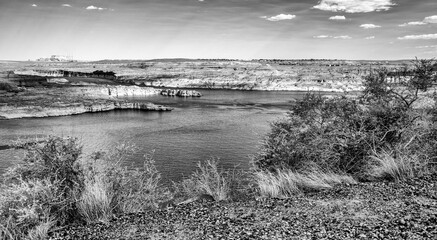 Fototapeta premium Glen Canyon Dam and Colorado River on a clear summer day.