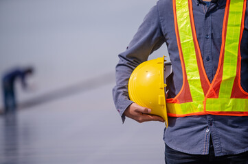 Engineer holding hard hat construction worker professional safety work industry building person manager service