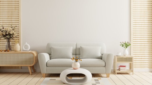 Empty living room with gray sofa and table on empty white wall background. 3d rendering