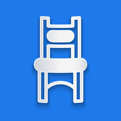 Paper cut Chair icon isolated on blue background. Paper art style. Vector