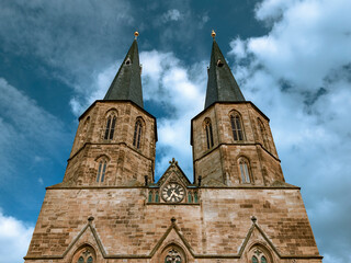 Obraz premium Upper portal and towers of the Basilica St. Cyriakus in Duderstadt