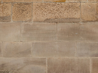 Straight line sandstone ashlar wall, image filling background, texture