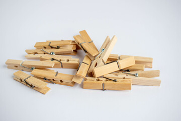 Wooden clothes peg, insulated on white background