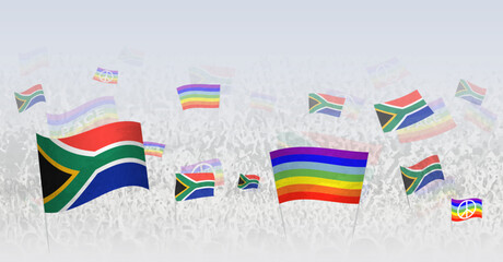 People waving Peace flags and flags of South Africa. Illustration of throng celebrating or protesting with flag of South Africa and the peace flag.