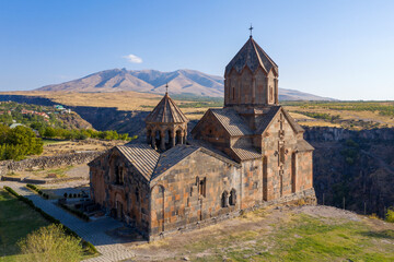 Aerial view of Hovhannavank monastery and Mount Ara on sunny summer day. Ohanavan village, Aragatsotn Province, Armenia.