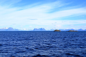 Obraz premium Mountains and fjords on Lofoten islands, Norway viewed from the boat