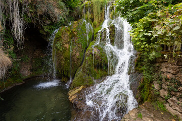 Fototapeta na wymiar detail of waterfall #1 in Tobera village, municipality of Frías, province of Burgos, Spain