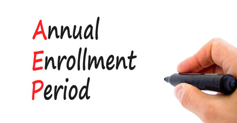 AEP symbol. Concept words AEP Annual enrollment period on beautiful white paper. Doctor hand. Beautiful white table white background. Medical and AEP Annual enrollment period concept. Copy space.