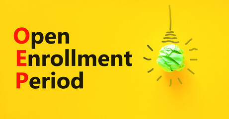 OEP symbol. Concept words OEP Open enrollment period on beautiful yellow paper. Light bulb icon....