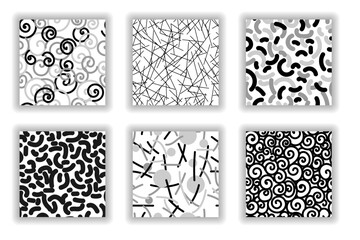 Set of abstract monochrome black-gray-white black-and-white seamless patterns