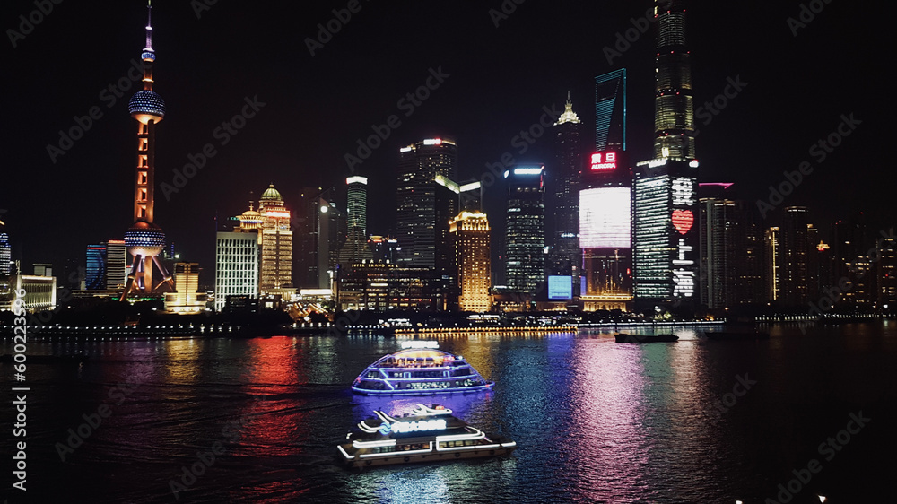 Wall mural shanghai, china: march 17 2017; light show on the bund in shanghai, eastern china. city at night ill