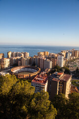 Naklejka premium view over Malaga at sunset travel banner