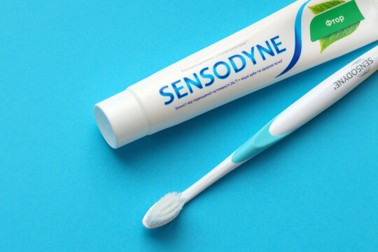 KYIV, UKRAINE - MAY 4, 2022 Sensodyne fluorine or fluor is a daily fluoride toothpaste that helps protect against tooth sensitivity