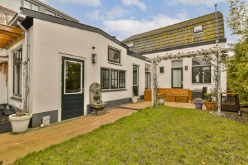 a house that is in the process of being remodeled and renovated, with new sidings on the front wall