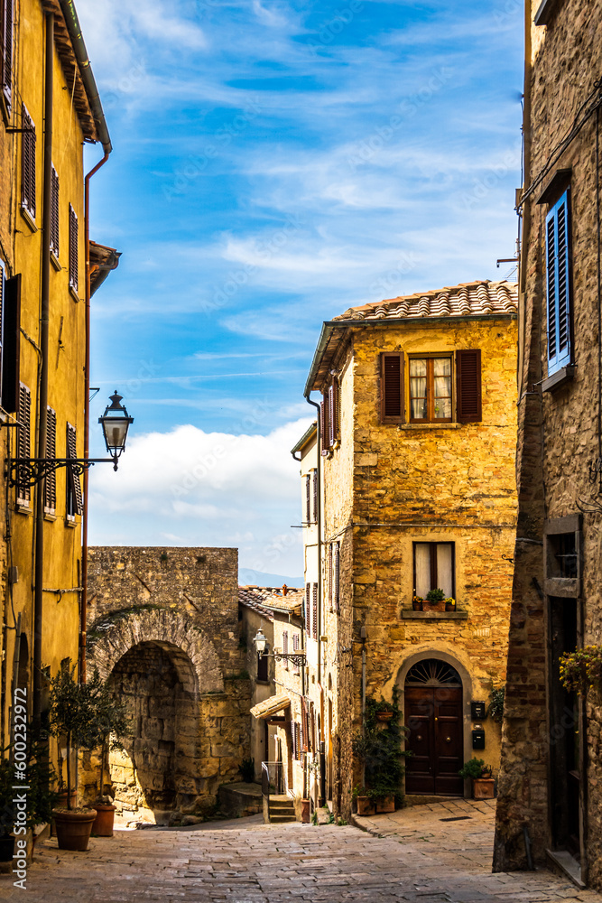 Sticker historic buildings at the old town of volterra in italy