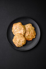 Delicious fried chopped fillet pancakes with spices, salt and herbs