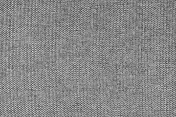 Fototapeta na wymiar Close-up texture of natural gray coarse weave fabric or cloth. Fabric texture of natural cotton or linen textile material. Blue canvas background. Decorative fabric for upholstery, furniture, walls