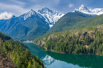 Fototapeta na wymiar Landscape of the Thunder Arm of Diablo Lake in the Snowcapped North Cascades Mountains and Forest in Whatcom County, Washington, USA