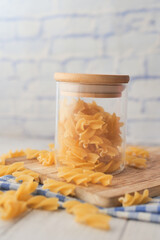 dry pasta in a jar on table ,
