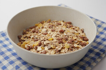 Home Made Musli in a bowl on black,