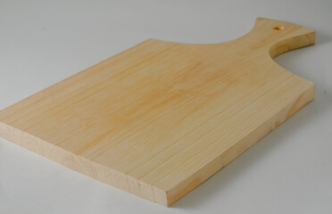 A wooden cutting board isolated on a white background