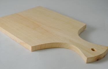 A wooden cutting board isolated on a white background