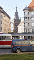 Obraz premium Traffic on the city street. Busy day in Prague, Czezh Republuc.
