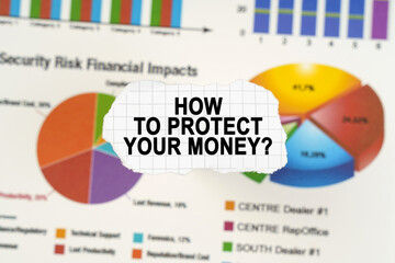 On diagrams and graphs lies torn paper with the inscription - How to protect your money