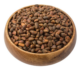 Unpeeled pine nuts in a wooden plate on a transparent background. isolated object. Element for design