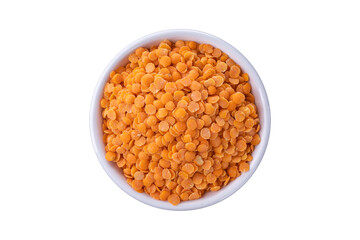 Red lentils pile isolated.