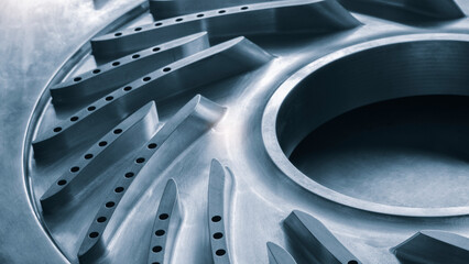 Steel blades of turbine propeller. Close-up view. Selected focus on foreground, engineering...