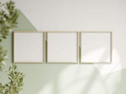 three square frames on the white and green wall, boy room interior frame mockup, print mockup, baby room mockup, kids room mockup, nursery interior frame mockup, gallery wall mockup, 3d render
