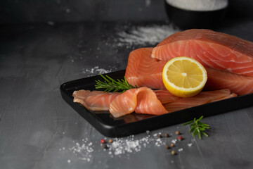 homemade smoked salmon with dill on a wooden table